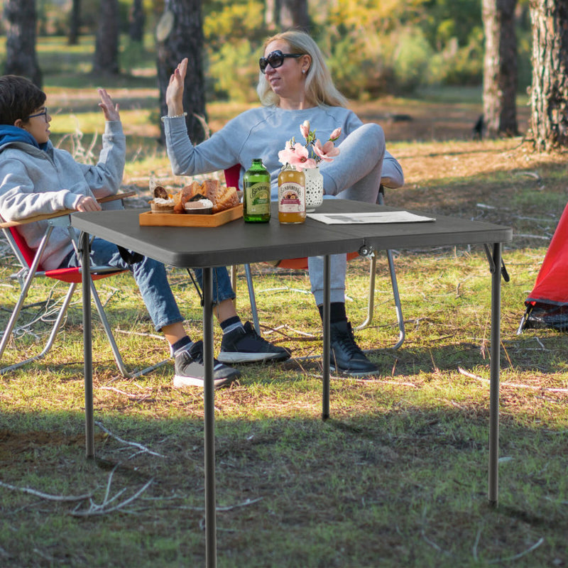 Professional title: ```Portable Camping Table with Weather-Resistant HDPE Tabletop and Corrosion-Resistant Steel Frame in White```